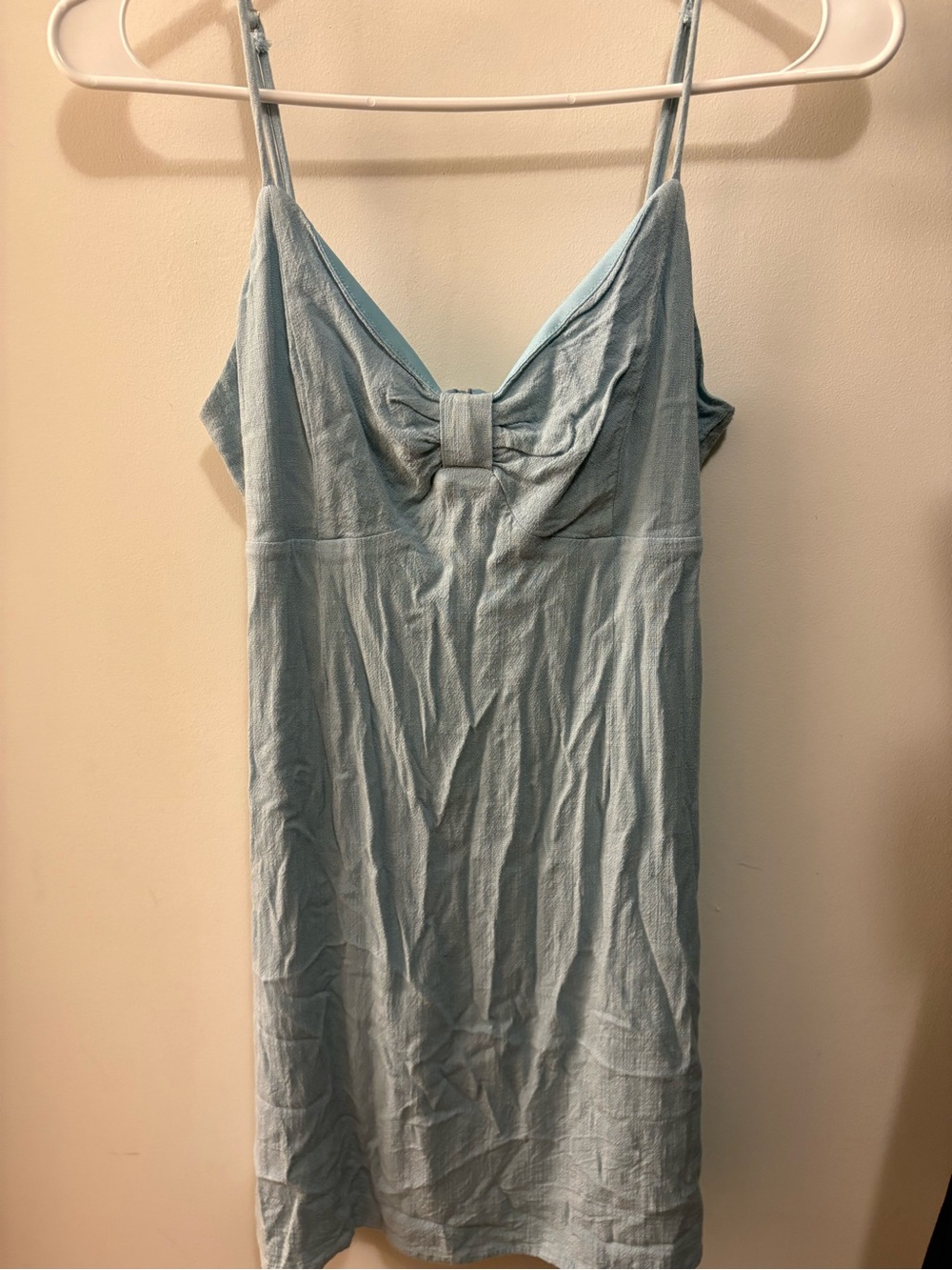 Blue mini dress from
Boutique in cape cod size small with bow in front